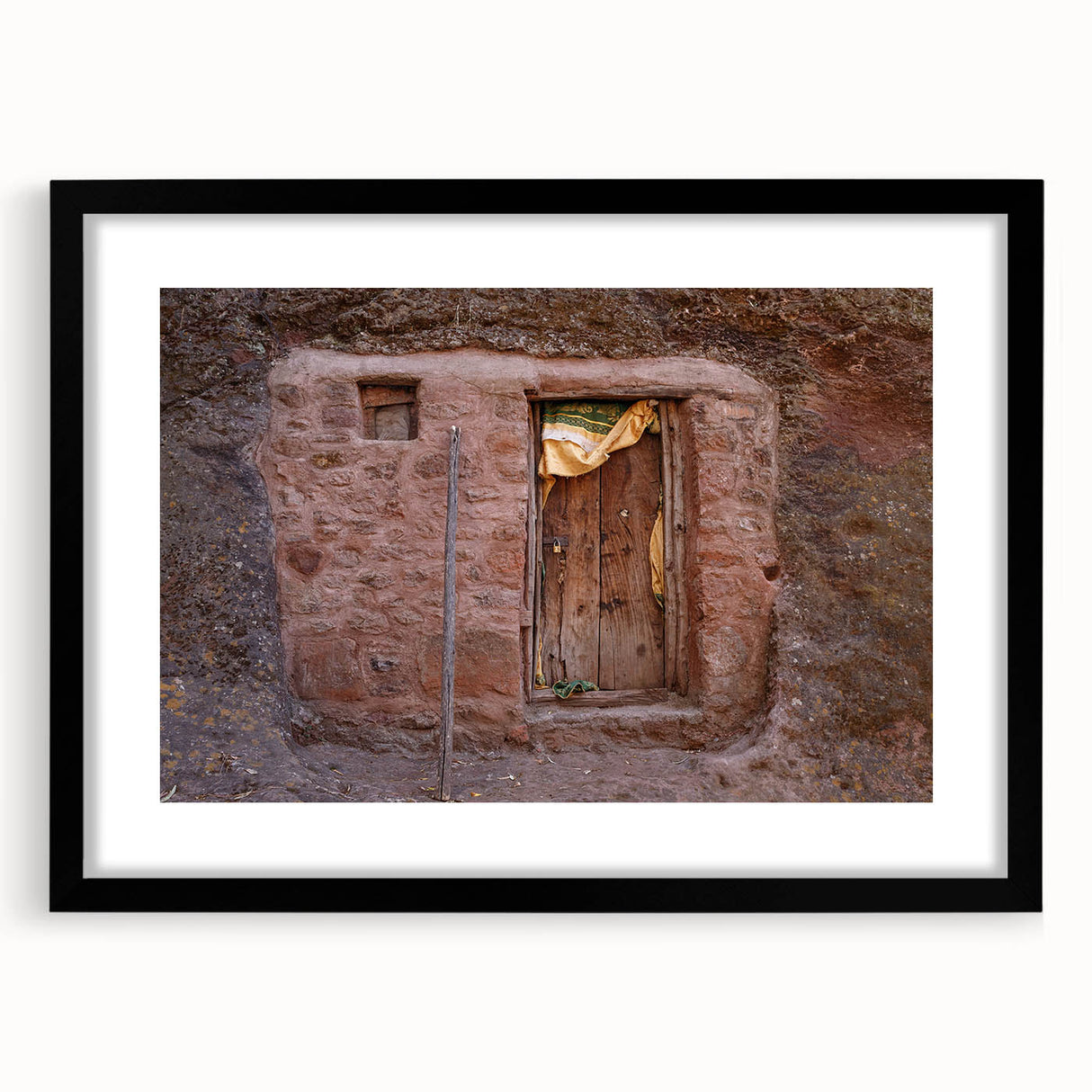 Extra large abstract art print featuring a colorful, textured depiction of an Ethiopian landscape on a framed canvas.