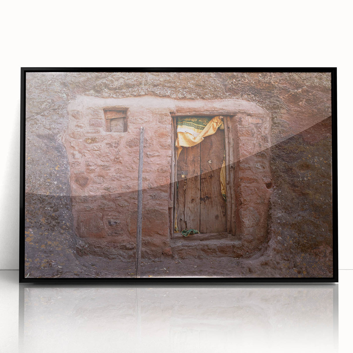 Large abstract wall art depicting an Ethiopian landscape in muted earth tones on a framed acrylic.