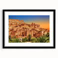 Extra large abstract art print of colorful Moroccan scenery on textured canvas, framed in black, ideal for living room decor.