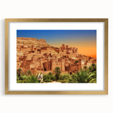 Textured abstract art print of a Moroccan landscape in muted earth tones on a framed canvas, ideal for bedroom art.