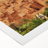 Art deco poster of a Moroccan landscape in earth tones on rolled canvas, suitable for dining room decor.
