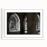 Abstract art print of Tanzanian scenery in muted earth tones on a framed white mat.