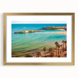 Abstract art print of a Tunisian landscape in muted earth tones, framed in gold, ideal for dining room decor.