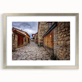 Textured abstract art print depicting a scenic Asian landscape in muted earth tones on a framed silver mat.