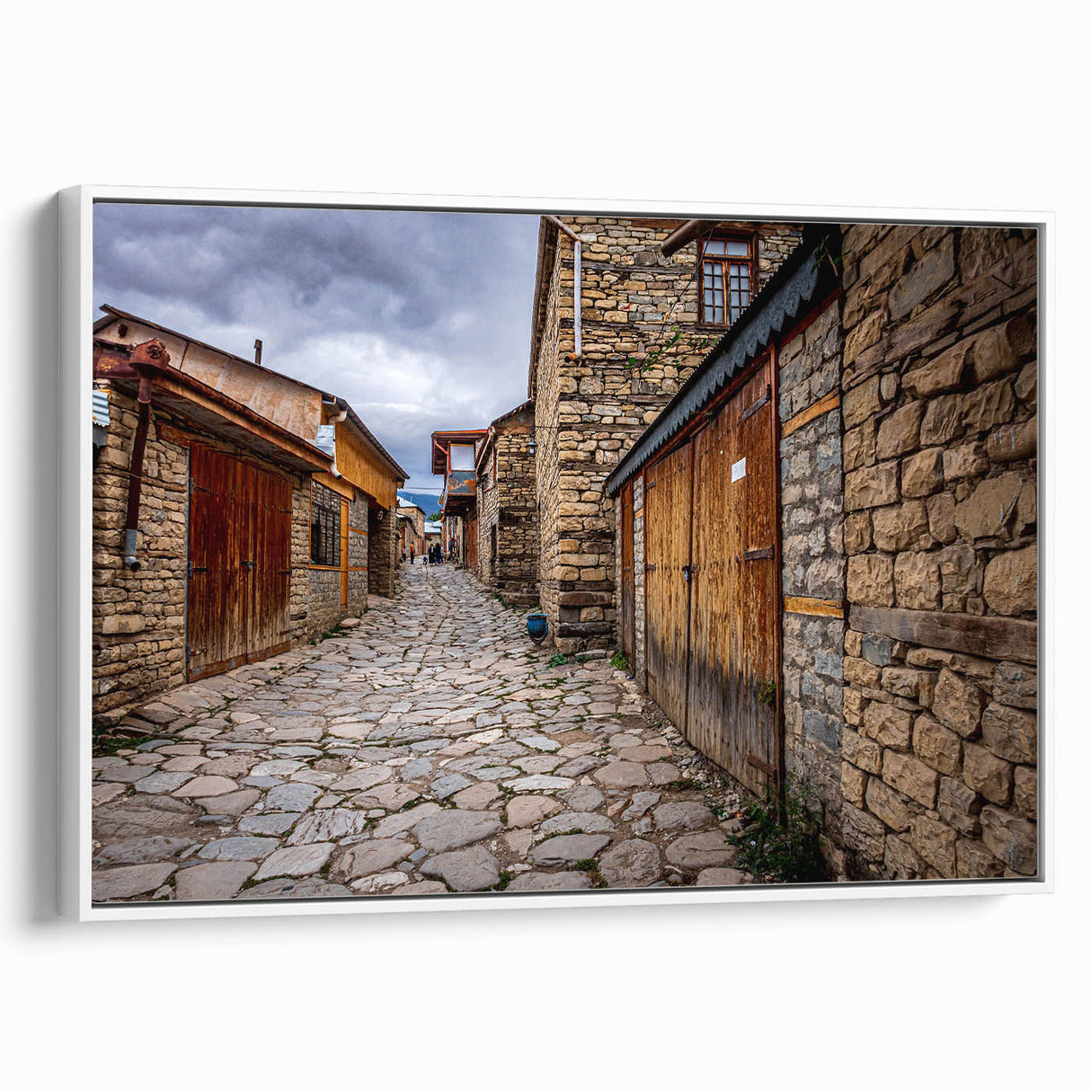 Vintage poster art of an Asian landscape on a framed canvas, blending colorful art with black accents.