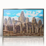 Mid-century modernist art depicting a Cambodian landscape in muted earth tones on a silver-framed acrylic print.