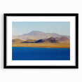 Extra large abstract art print of a colorful Tibetan landscape, textured finish, framed with black mat.