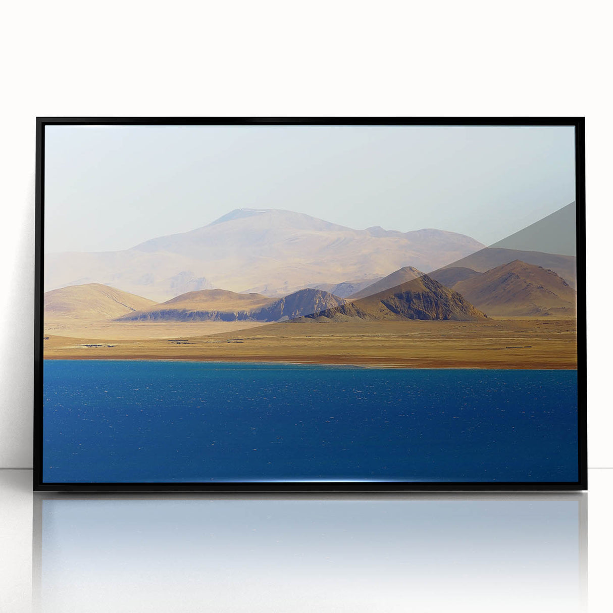 Framed acrylic print of a large abstract depiction of Tibetan landscape in muted earth tones.