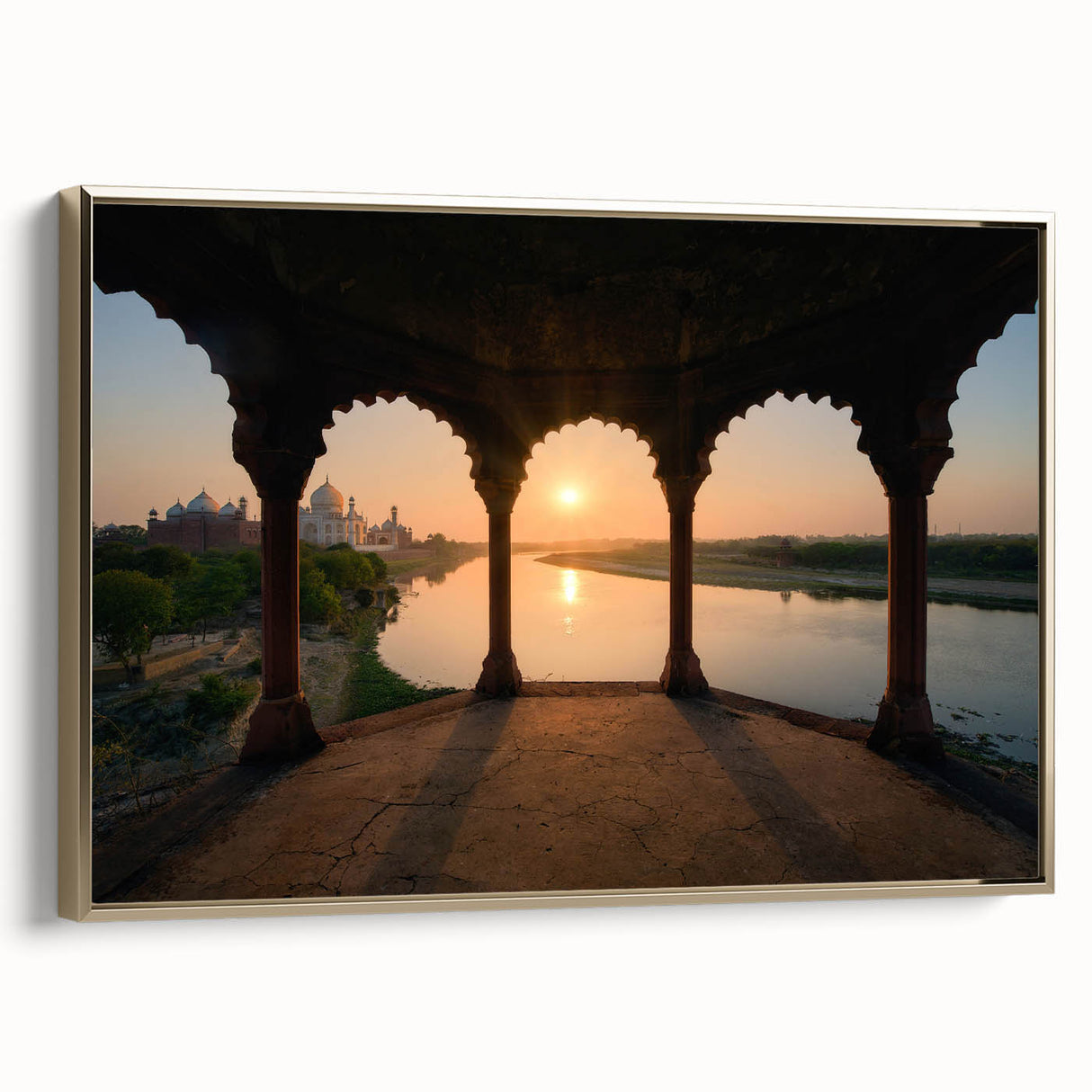 Framed canvas of a vintage-style Indian landscape in gold and black tones, suitable for bedroom wall art.
