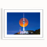 Abstract art print of a Korean landscape in muted earth tones on a framed white mat, ideal for dining room decor.