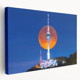 Large wall art depicting a serene Korean landscape in muted green and blue tones on stretched canvas.