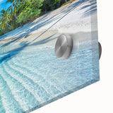 Large abstract wall art depicting the Maldives in muted blue and green hues on acrylic glass, ideal for dining room decor.