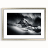 Textured art print of abstract Nepalese landscape in muted earth tones, framed in silver, ideal for bedroom art.
