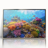 Acrylic print of the Great Barrier Reef in soft blue and green tones, framed in silver, suitable for modern art wall decor.