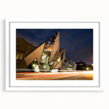 Abstract art print depicting a serene Ontario landscape in muted blue and green tones on a framed white mat.