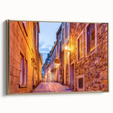 Framed canvas featuring a vintage-style landscape painting of Quebec, with muted earth tones, ideal for bedroom wall art.