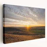 Landscape painting of Saskatchewan scenery on stretched canvas, featuring muted green and blue tones.