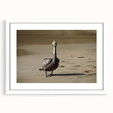 Textured abstract art print of a Caribbean scenery in muted blue and green tones, framed with a white mat.