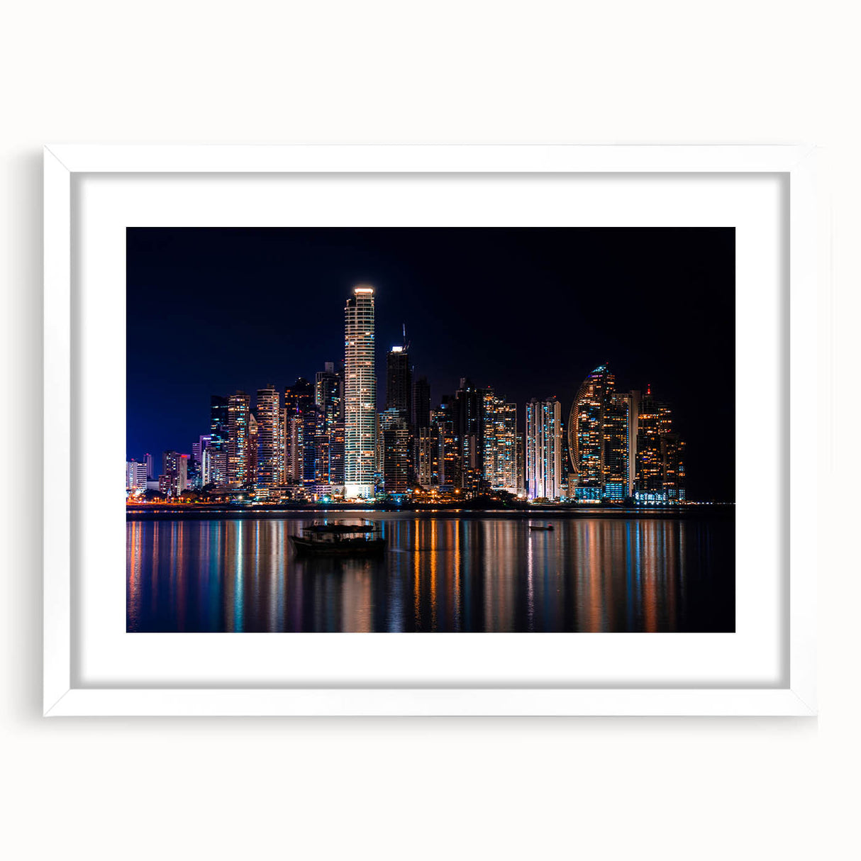 Abstract art print of Central American scenery in muted earth tones, framed with a white mat, suitable for dining room decor.