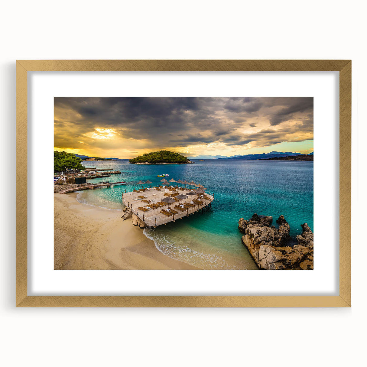 Abstract art print of a European Albanian landscape in muted gold and blue tones, framed with a gold mat.