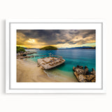 Textured abstract art print of an Albanian landscape in muted earth tones, framed with a white mat.