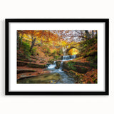 Extra large abstract art print featuring a colorful, textured portrayal of a European scenery on a black framed canvas.