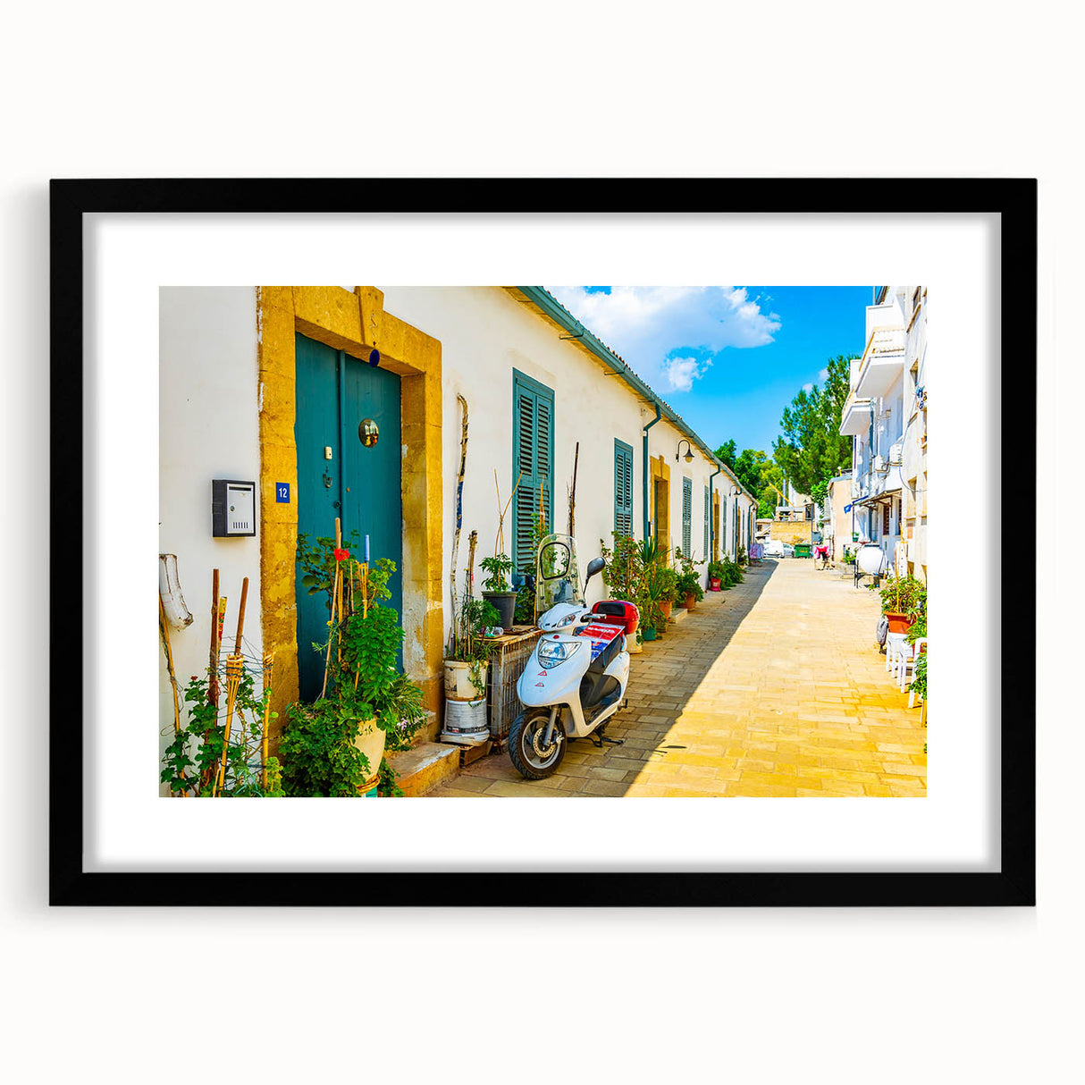 Colorful abstract art print of a European landscape in vibrant hues on a large textured canvas, ideal for living room decor.