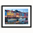 Extra large abstract art print depicting vibrant, colorful European scenery on a textured canvas, framed in black.