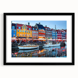 Extra large abstract art print depicting vibrant, colorful European scenery on a textured canvas, framed in black.