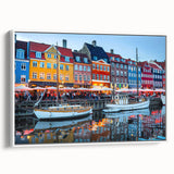 Vintage poster art of a European Denmark scenery on extra large framed canvas, with colorful art on a black background.