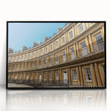 Large abstract wall art depicting a European cityscape in muted gray and blue tones on a framed acrylic.