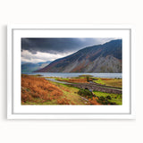 Textured abstract art print of Cumbria, England, in muted earth tones on a framed white mat, suitable for bedroom decor.