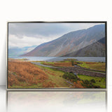 Large art print of Cumbria, England landscape in muted green and blue tones, framed in silver acrylic.