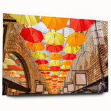 Side view of a large acrylic glass print depicting the Piccadilly area in England, in muted earthy tones.