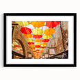 Abstract art print of Piccadilly, England with vibrant hues on a textured, extra large canvas, framed in black.