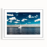 Textured abstract art print of a European landscape in muted earth tones on a framed white mat, ideal for bedroom art.