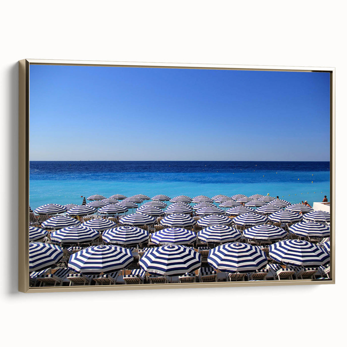 Framed canvas featuring a vintage-style landscape painting of Nice, France in muted gold and black tones.