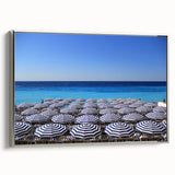 Framed canvas featuring a vintage-style landscape painting of Nice, France, with colorful art on a black background.