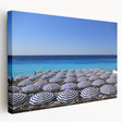 Large canvas print of a scenic view of Nice, France, with muted blue and beige tones, ideal for kitchen wall art.
