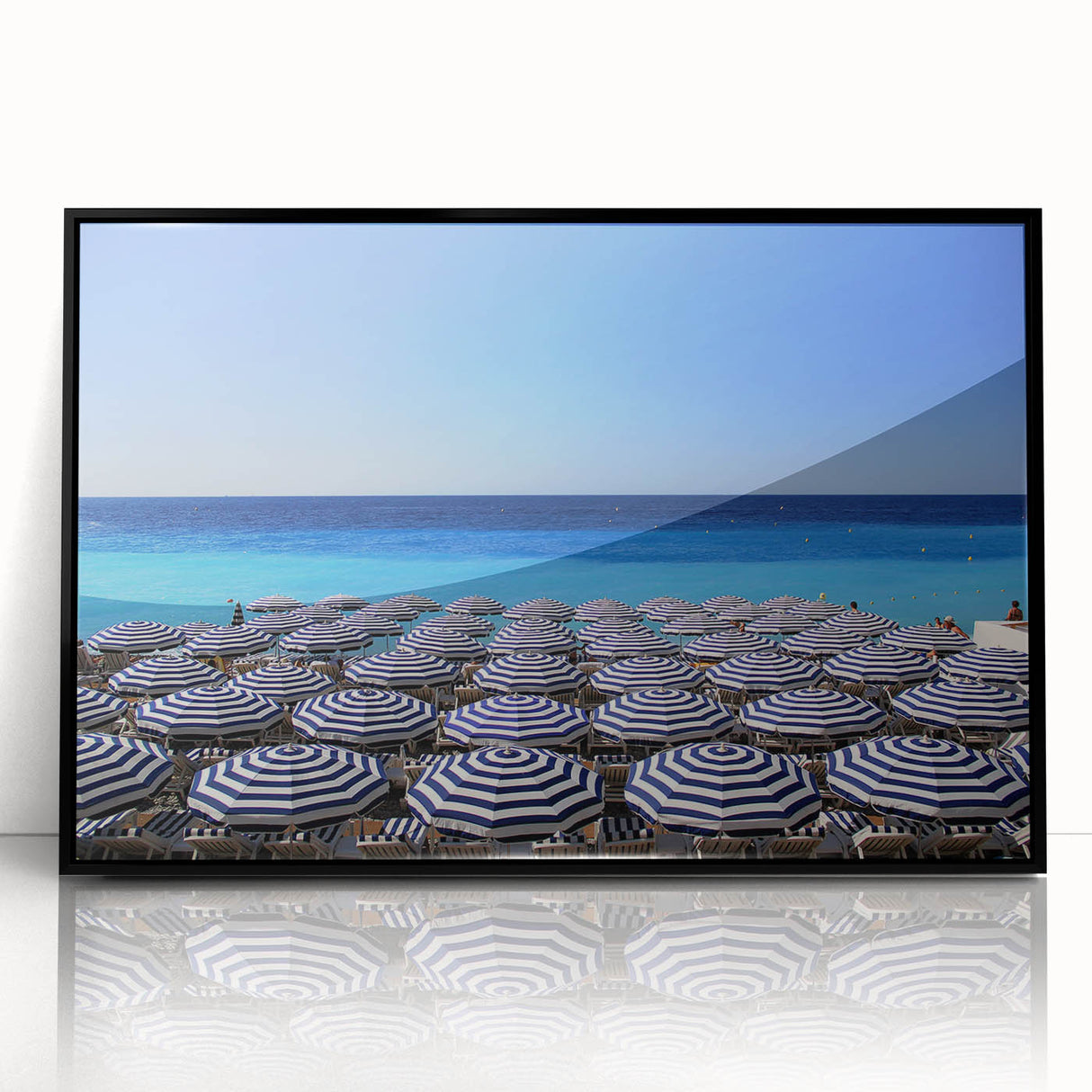 Large abstract wall art depicting a European scenery in muted earth tones, framed in black acrylic.