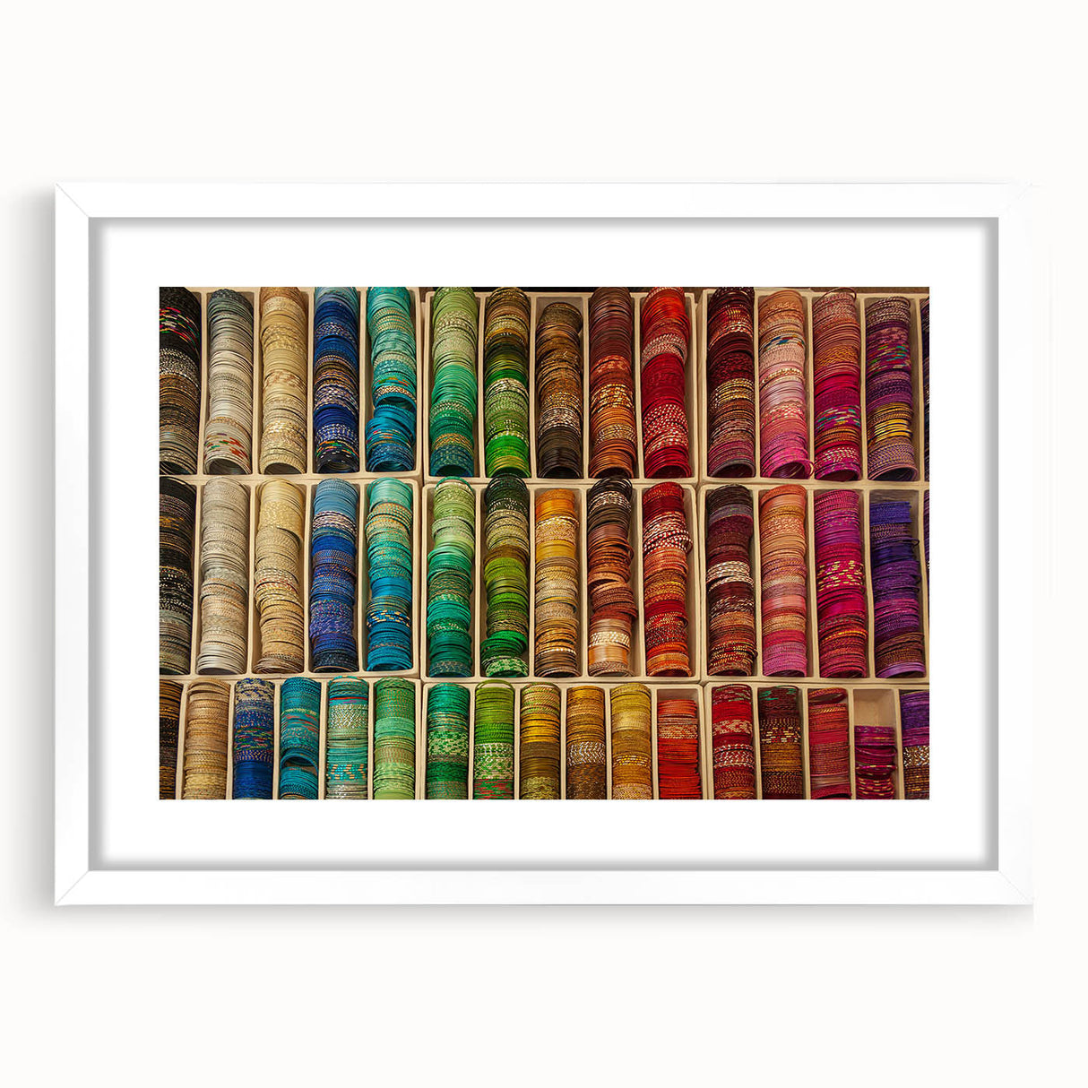Textured art print of an abstract European landscape in muted earth tones on a framed white canvas.