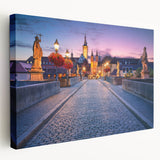 Side view of a stretched canvas depicting a Bavarian landscape in muted green and blue tones, suitable for kitchen wall art.