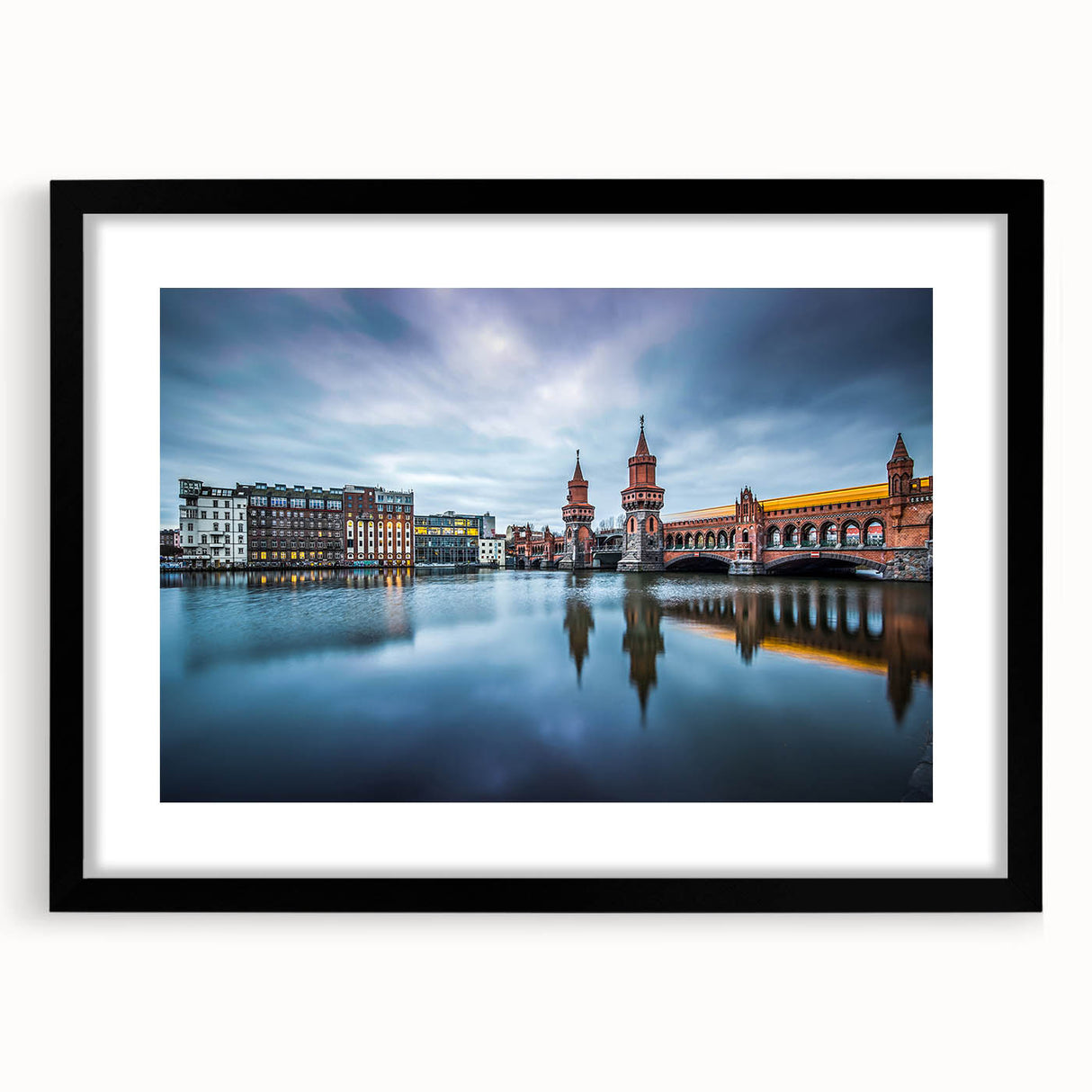 Extra large abstract art print of a colorful Berlin cityscape, textured and framed in black, ideal for living room decor.