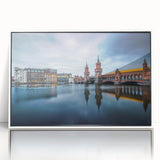 Mid-century modernist art of Berlin skyline in muted gray and blue tones on framed acrylic.