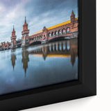 Framed canvas featuring a textured depiction of Berlin with a black background and vibrant color accents.