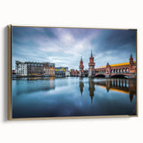 Framed canvas wall art depicting a vintage-style Berlin landscape in black and gold tones, ideal for bedroom decor.