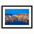 Colorful abstract art print of a European scenery in Crete, displayed in a large black frame with a mat.