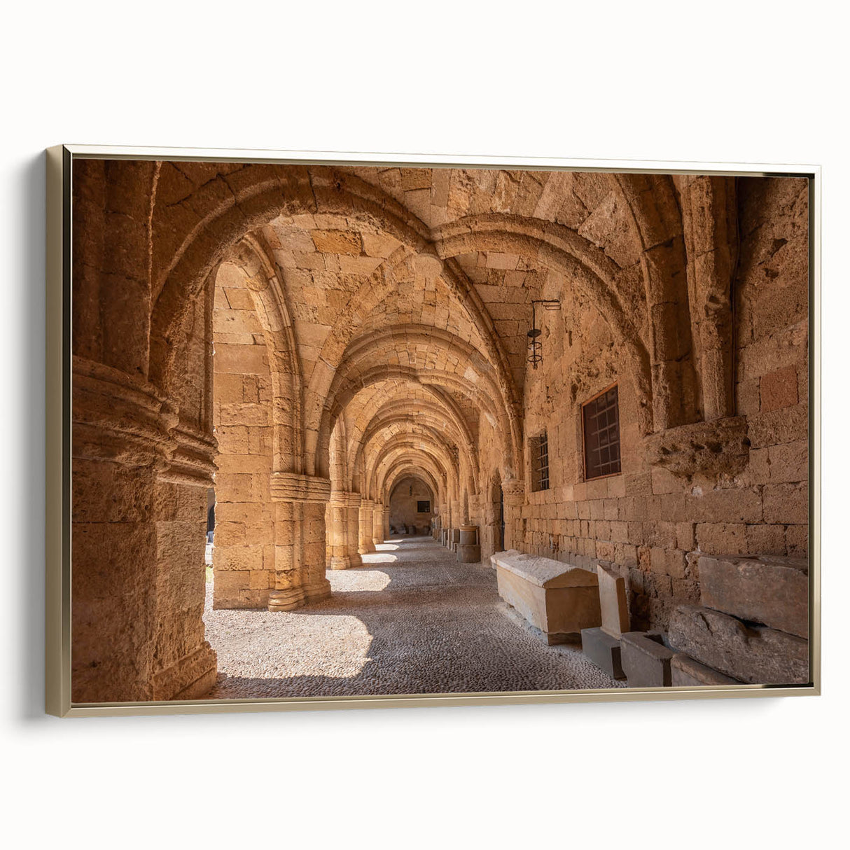 Framed canvas depicting a vintage-style landscape of Rhodes, Greece in muted gold and black, ideal for bedroom wall art.