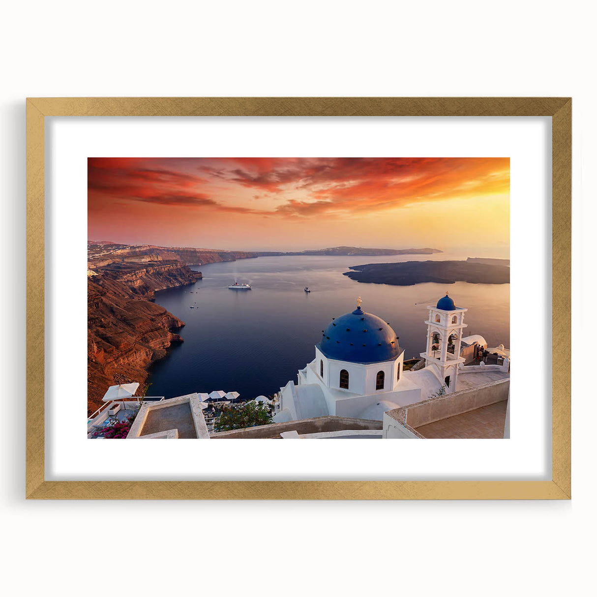Abstract art print of Santorini with blue and white hues on a gold-framed mat, ideal for dining room decor.