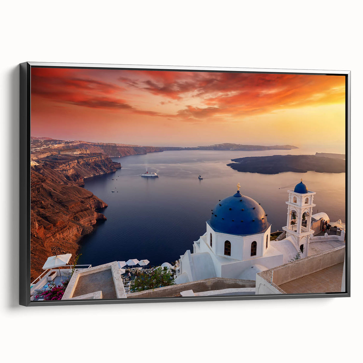 Black and white wall art of Santorini landscape on framed canvas, ideal for bedroom decor.